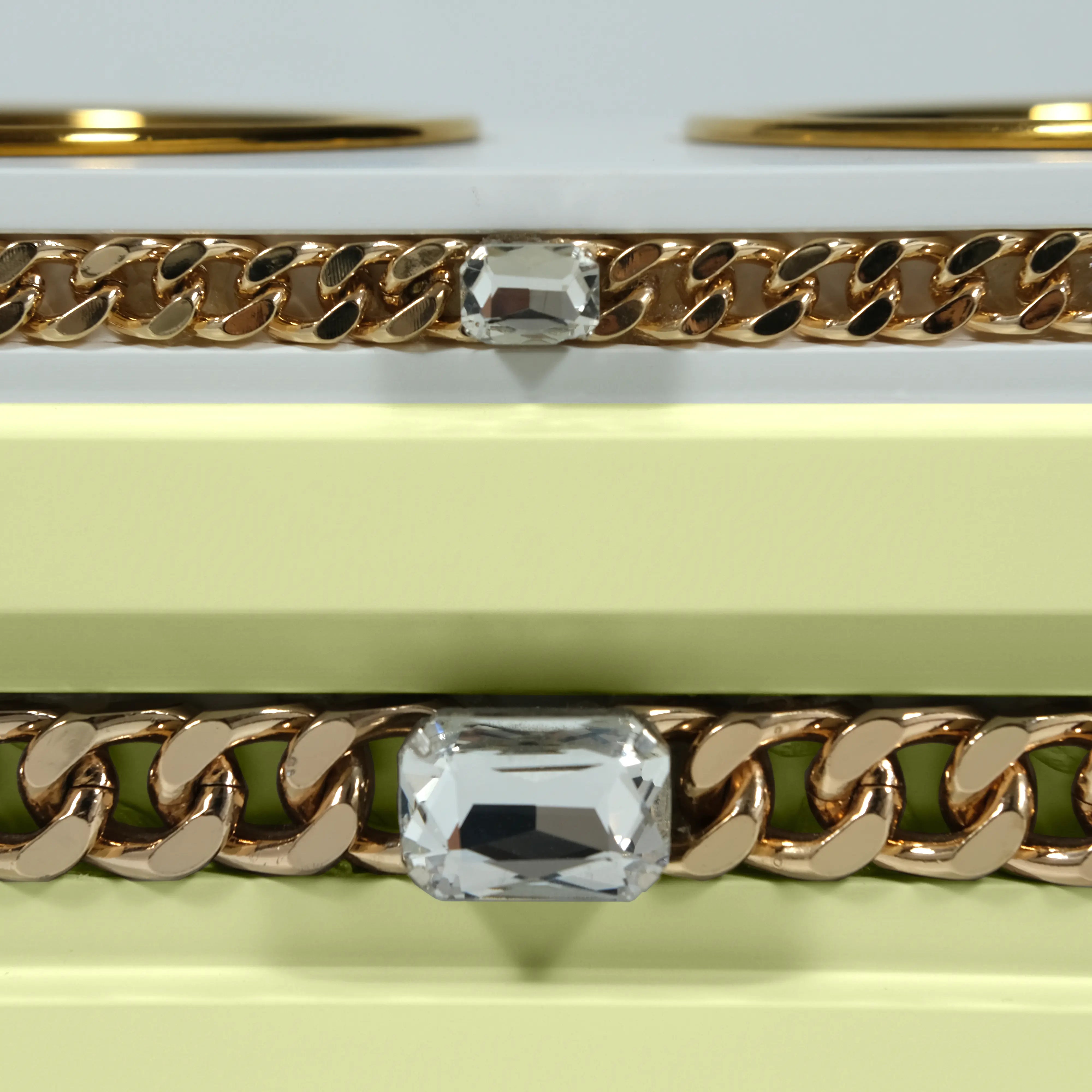 "Close-up detail of the jewelry-grade crystal and haute couture chain application on the FUROAR Sisi modern designer station."
