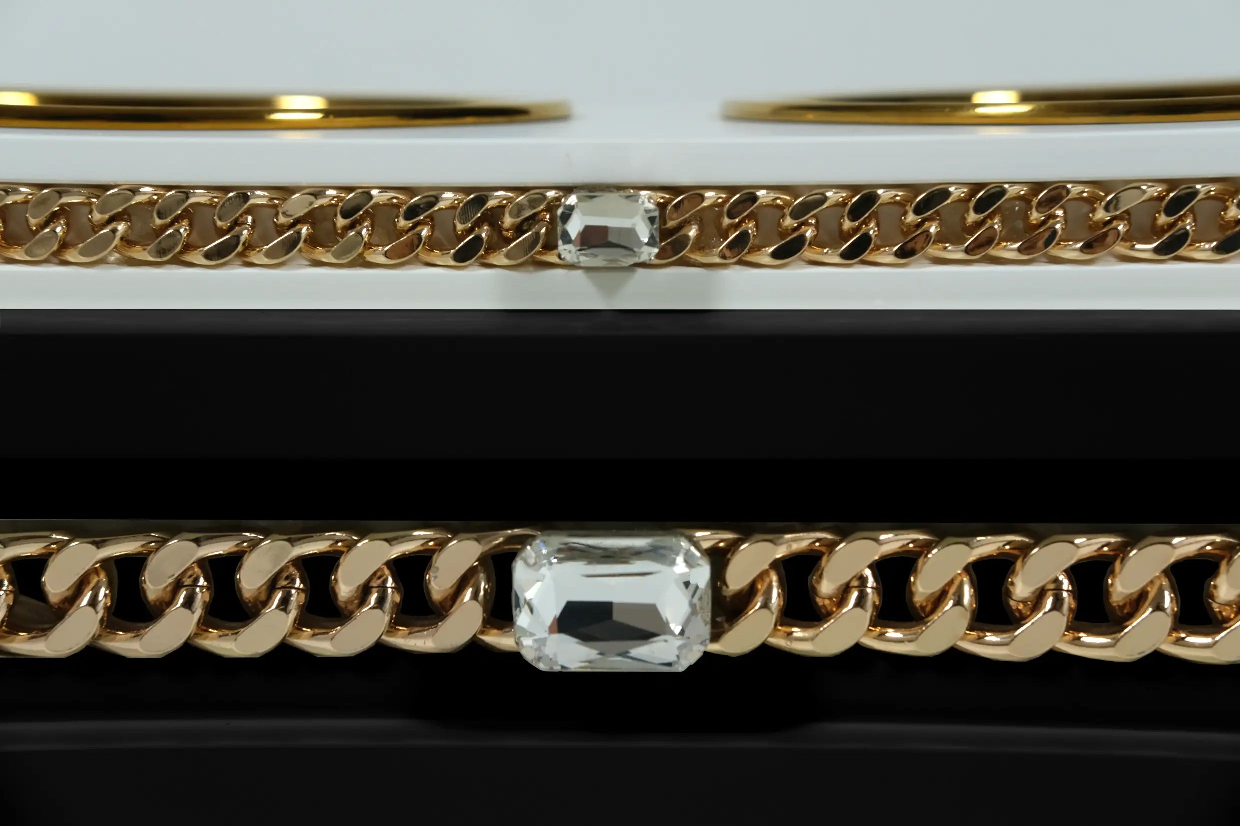 "Close-up detail of the jewelry-grade crystal and haute couture chain application on the FUROAR Spotty modern designer station."