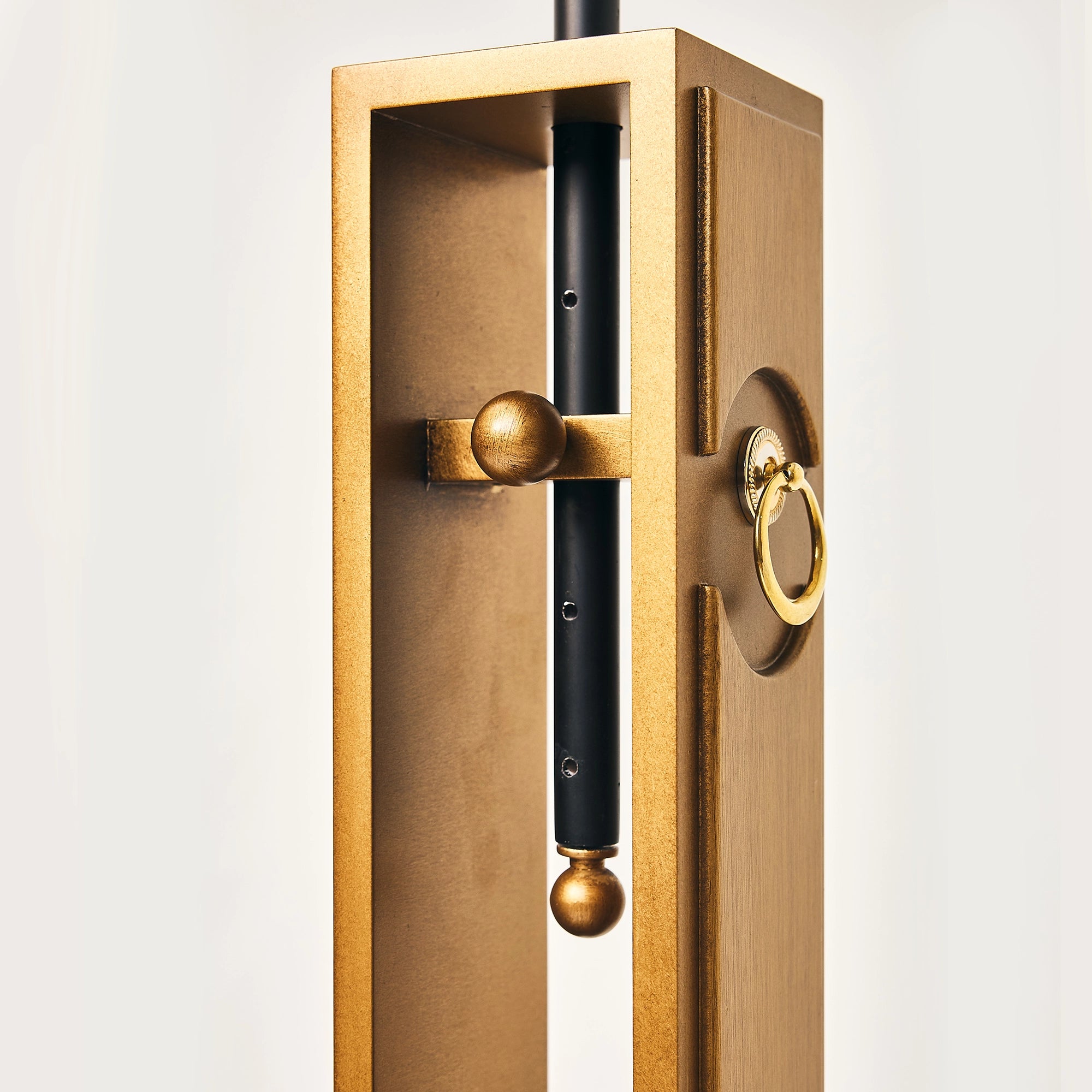 Close-up of the internal gold sliding mechanism on a FUROAR Nobel falcon perch.