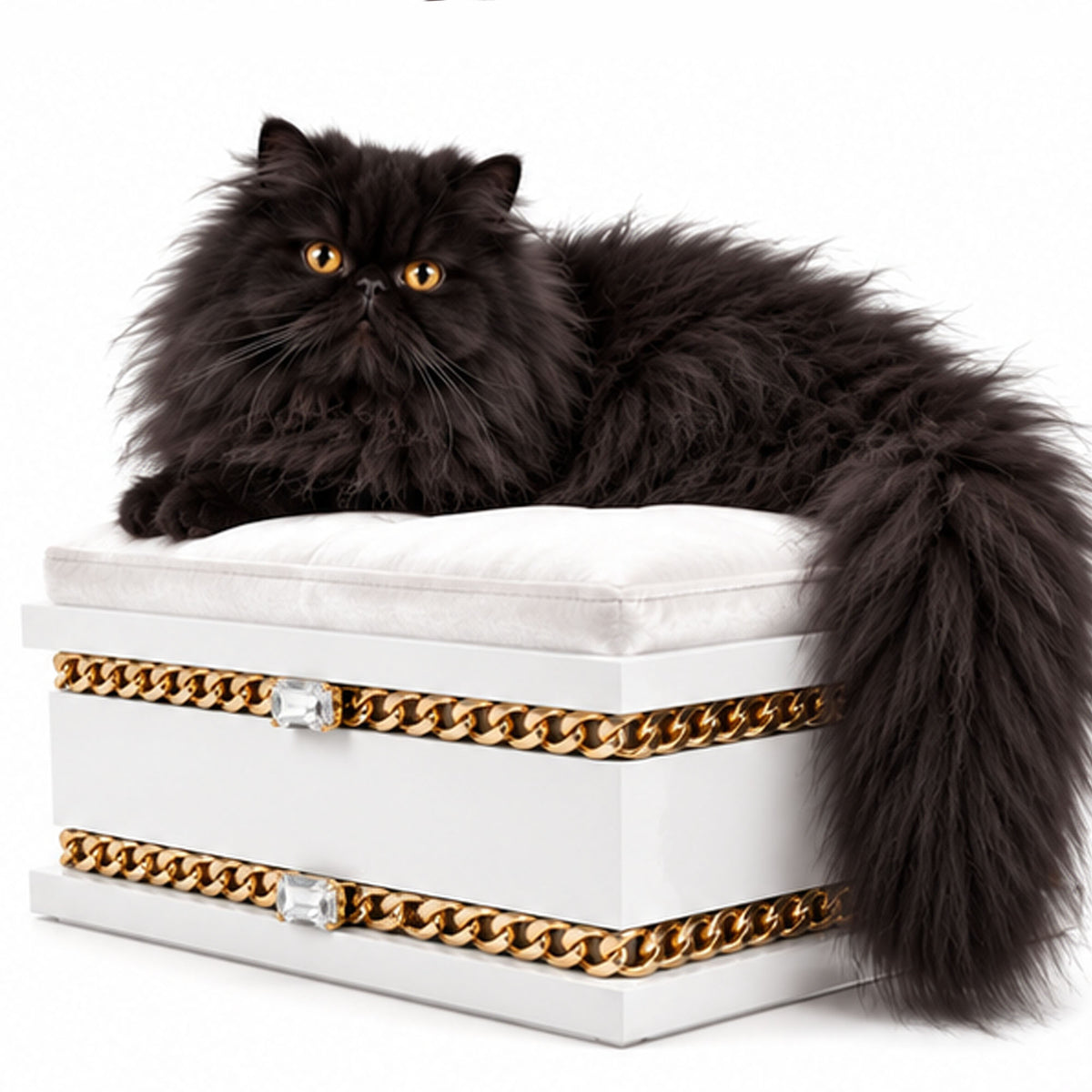 Long-haired black Persian cat relaxing on a FUROAR white luxury cat bed with gold chain detailing.