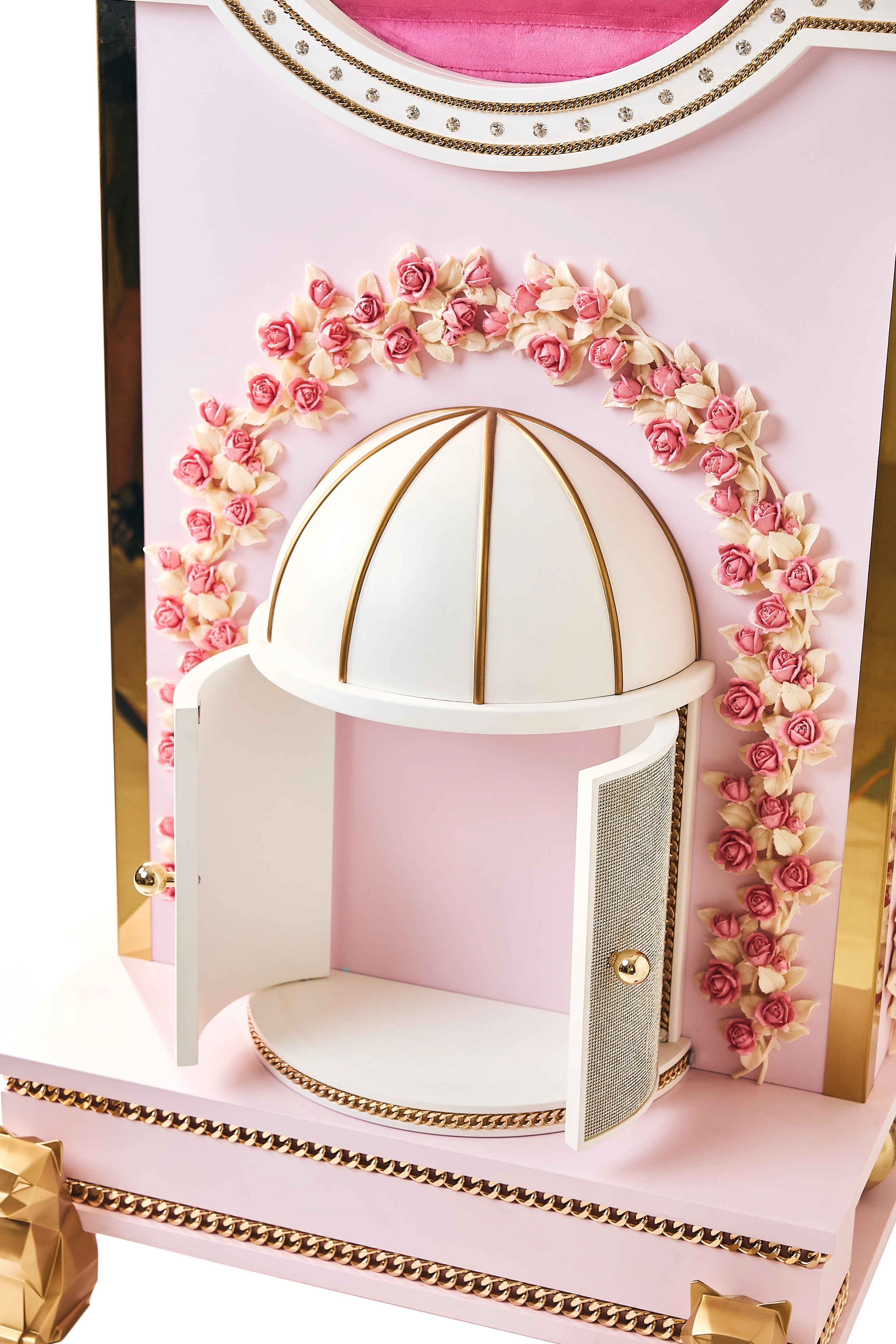 Detailed view of the hand-carved pink rose floral arch wrapping around an elegant domed side enclave on the FUROAR Bella pet mansion.