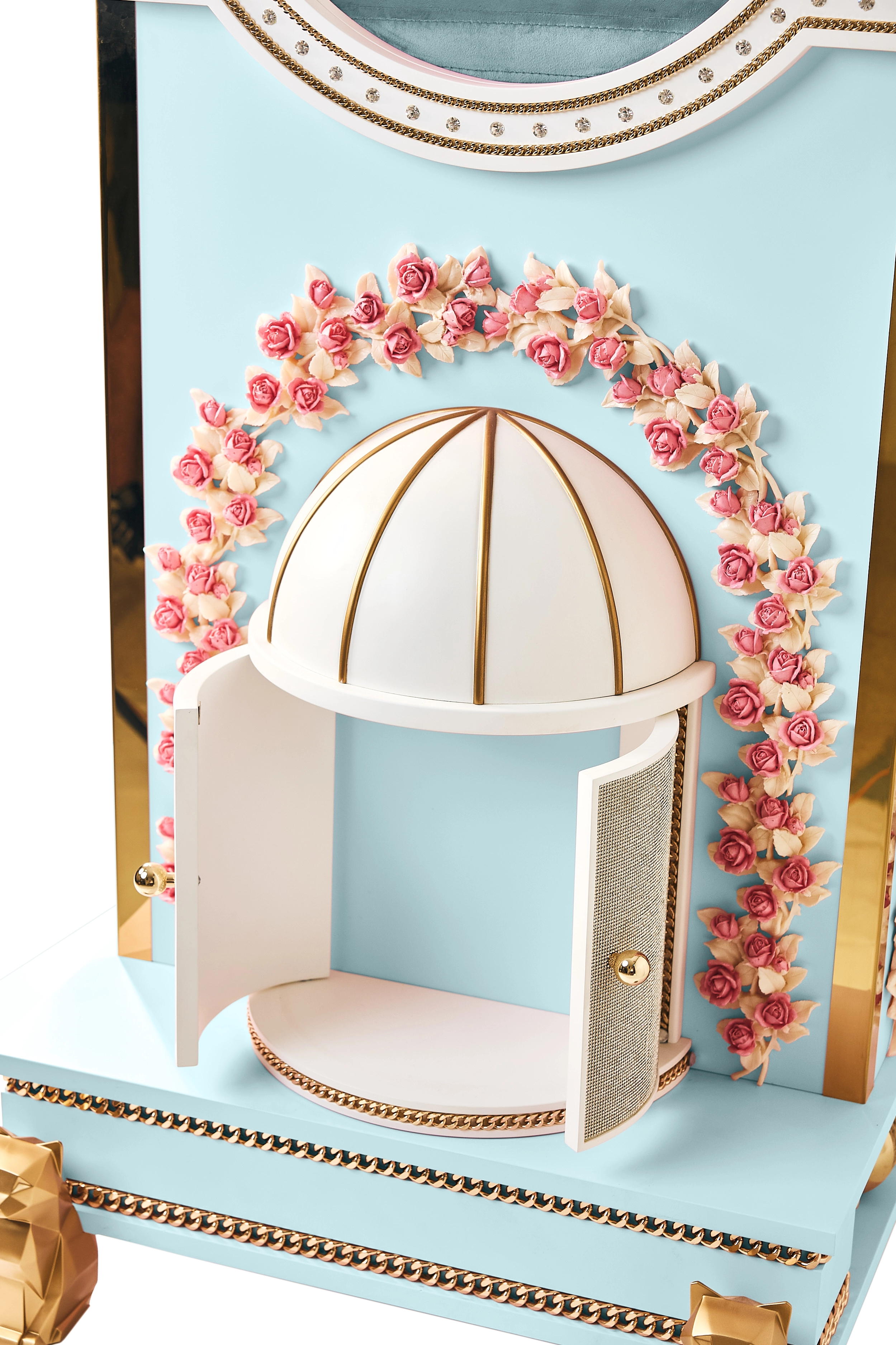 Detailed view of the hand-crafted pink rose arch framing an open domed entry portal on a baby blue FUROAR custom pet mansion.