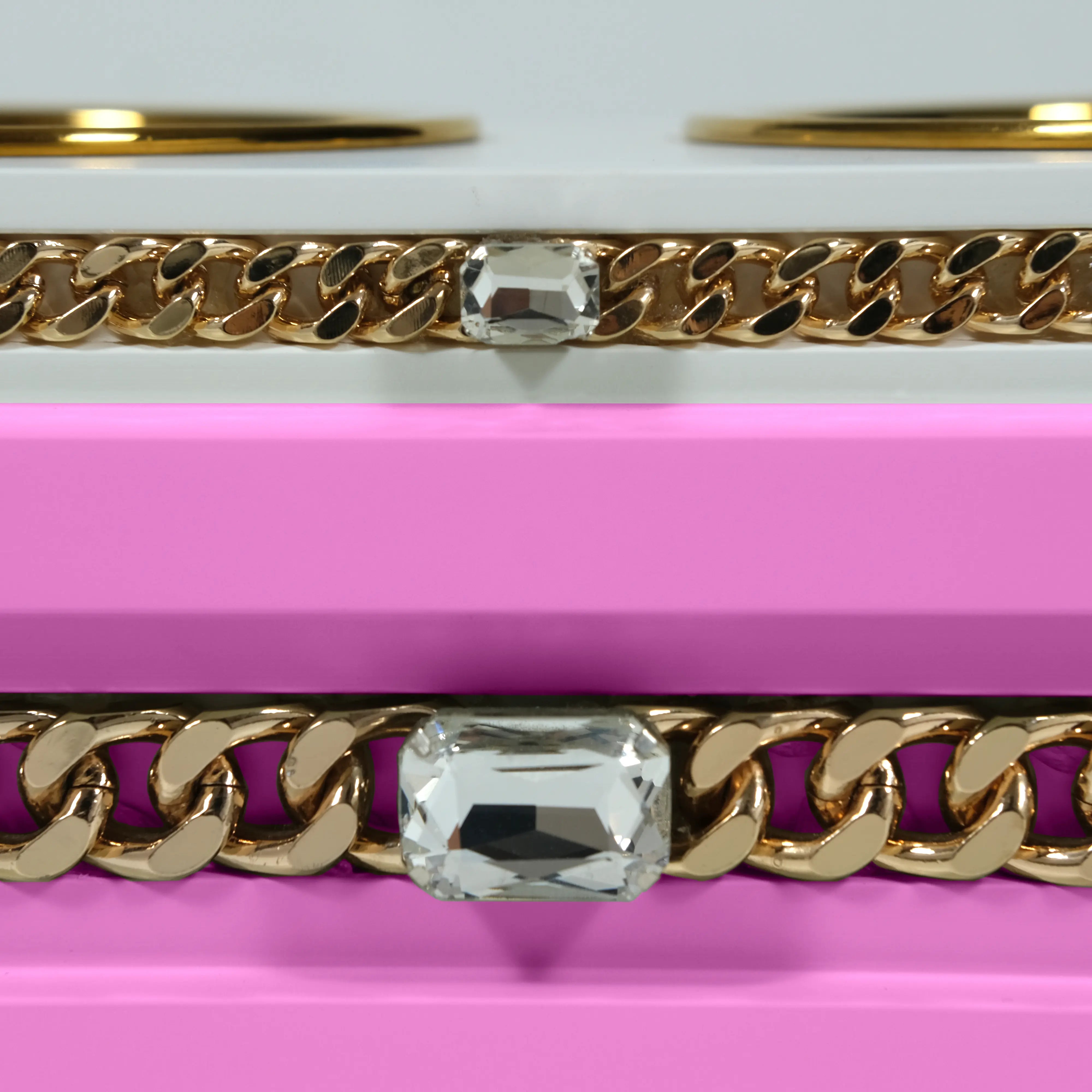 "Close-up detail of the jewelry-grade crystal and haute couture chain application on the FUROAR Sweetheart modern designer station."