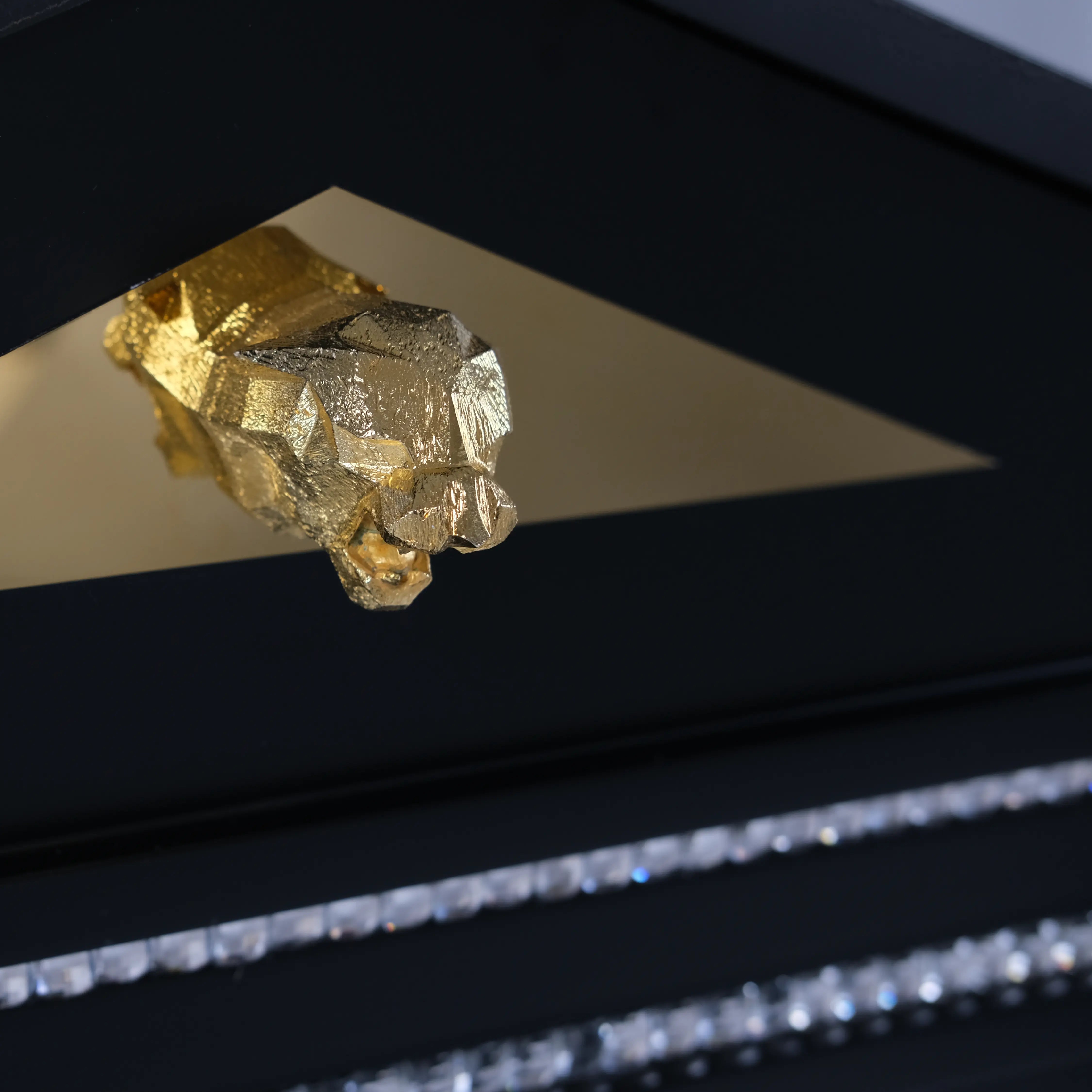24-carat gold FUROAR panther emblem on a super glam indoor dog kennel house.