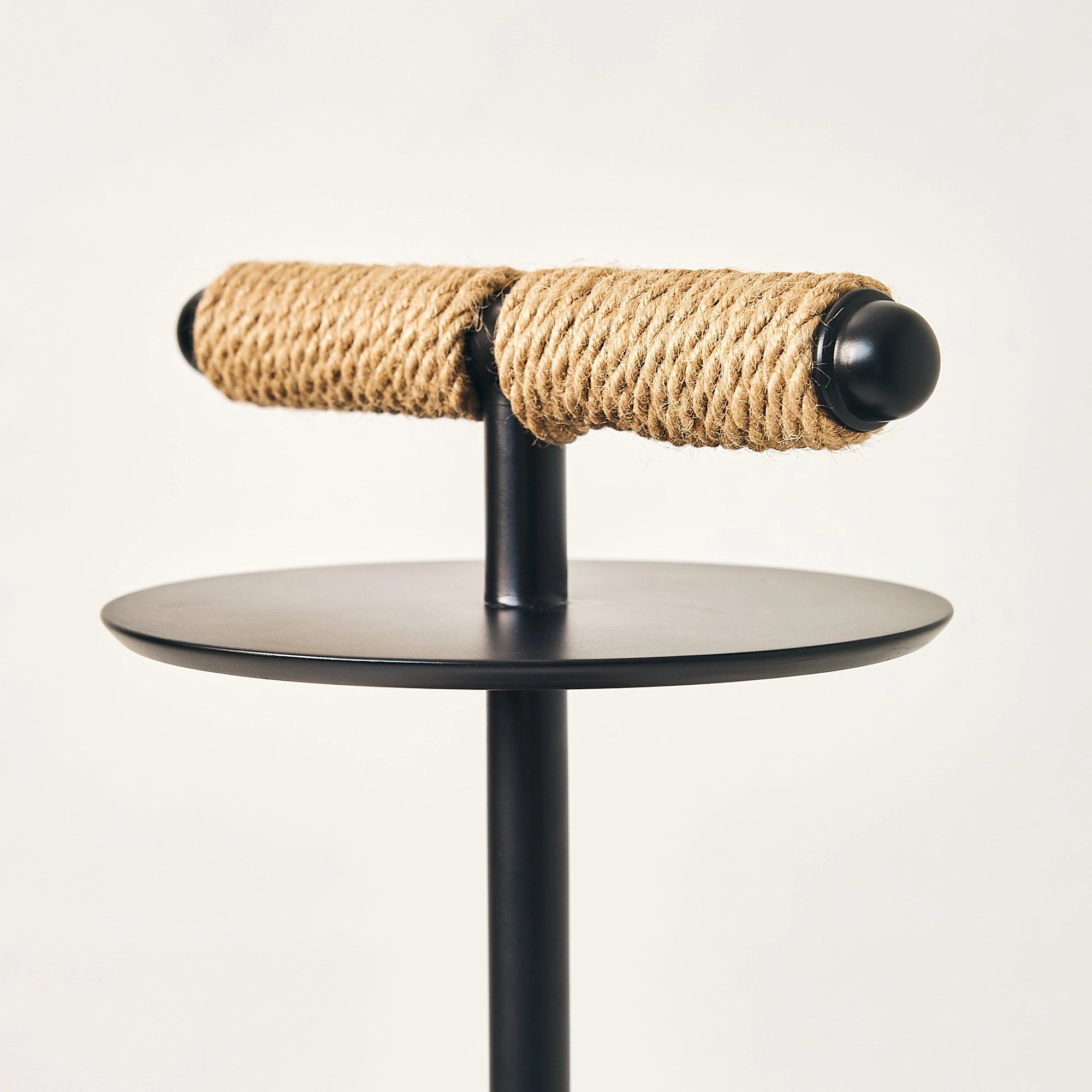 Natural fiber rope detail on a FUROAR falcon stand.