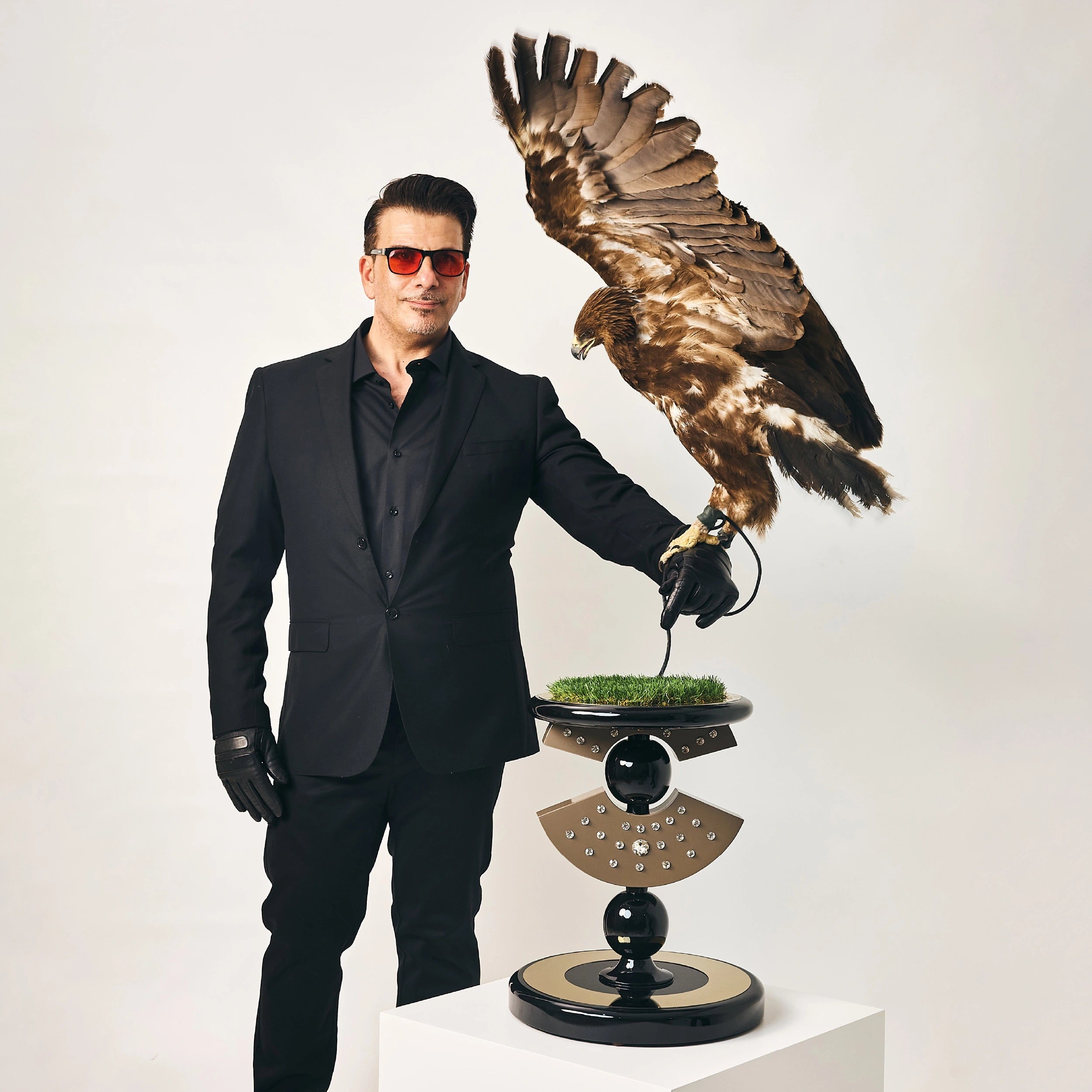 The Founder of FUROAR Jamal Hammoud with a Royal Falcon perch